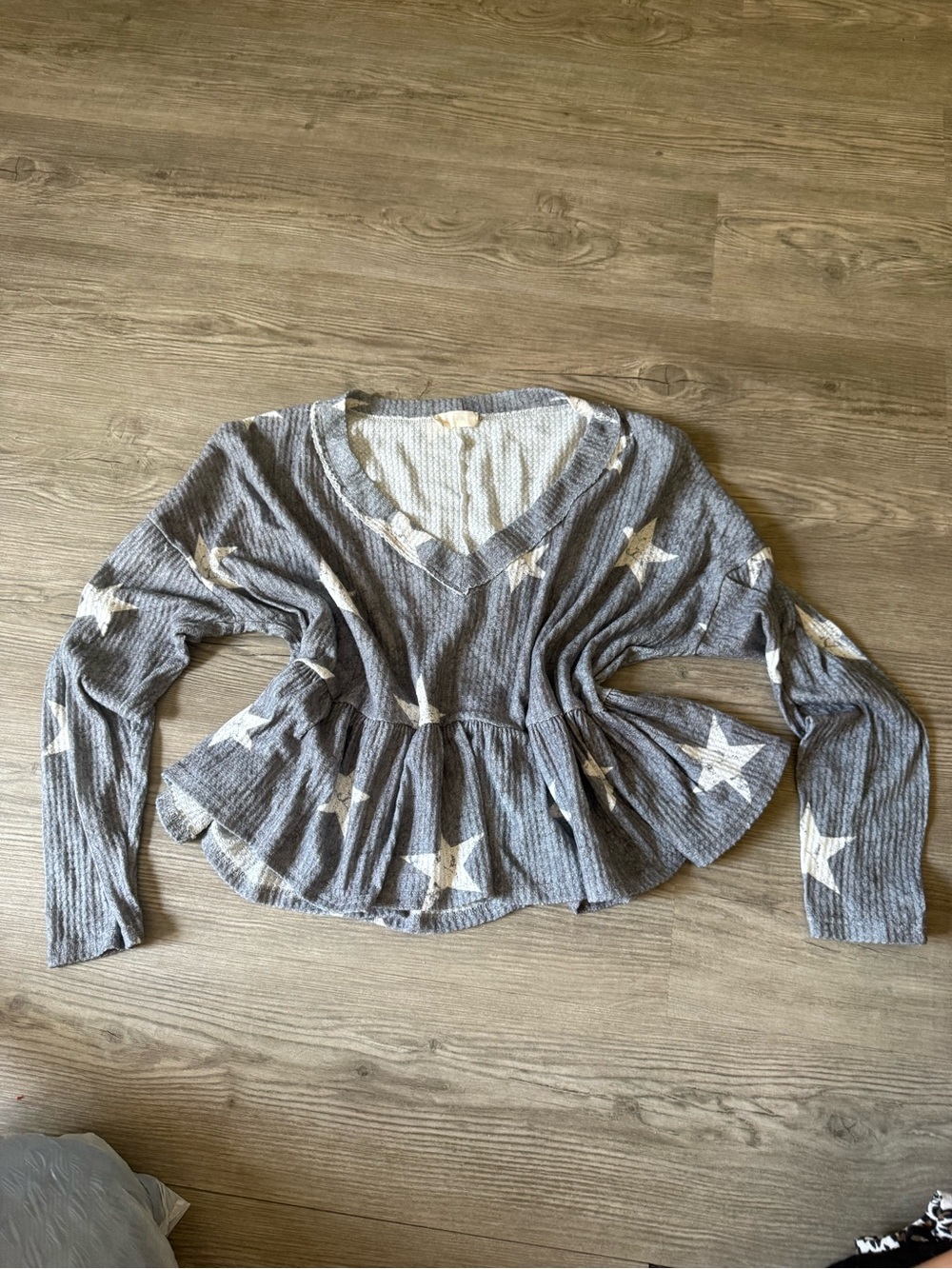 Grey Star Print Ruffled Hem V-Neck Top